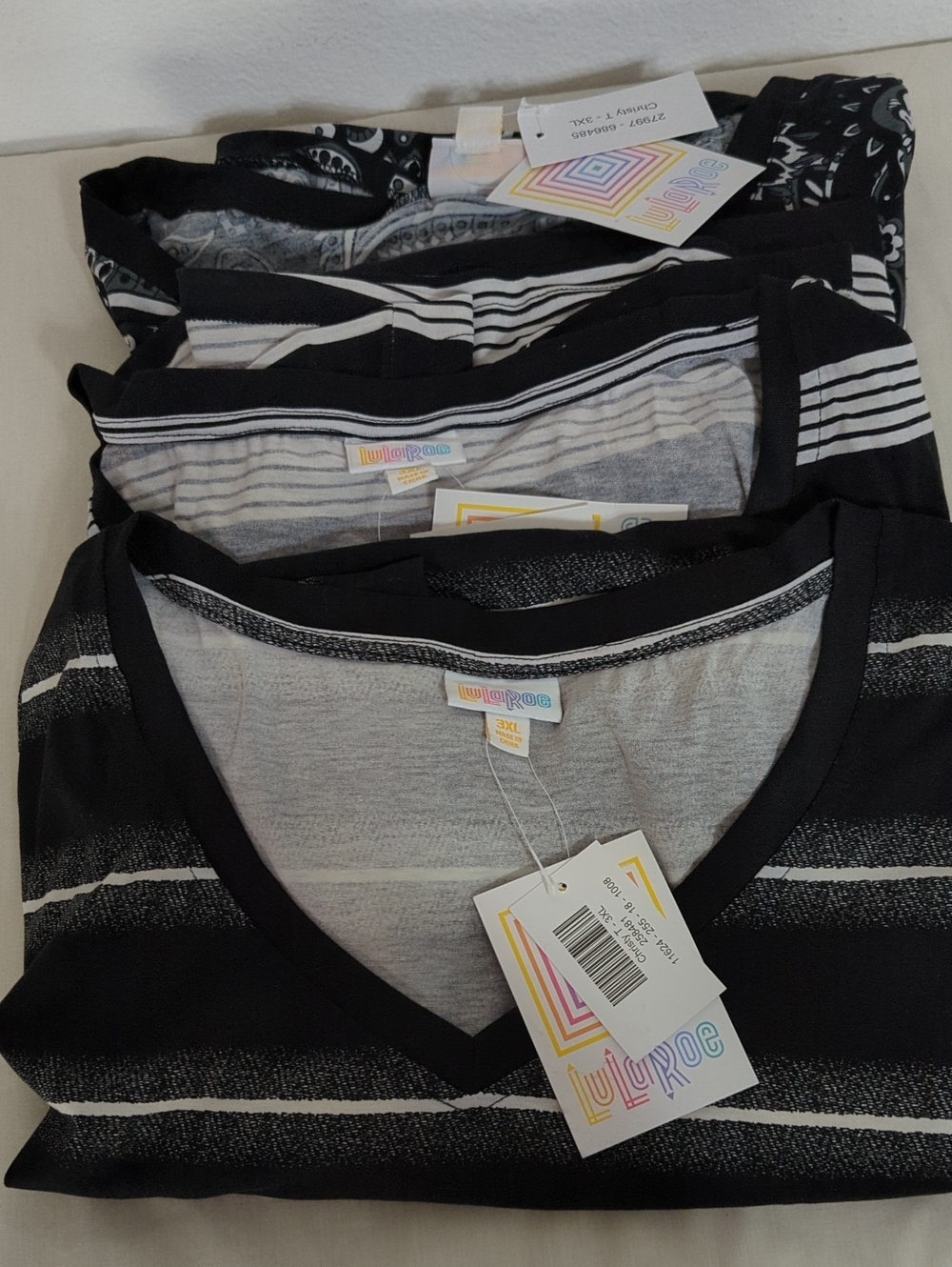 LuLaRoe Black & White Striped & Floral Paisley V Neck Tops Set of 3